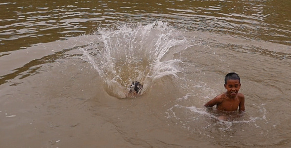 Young Boys Jumping Into River By Yoycg VideoHive